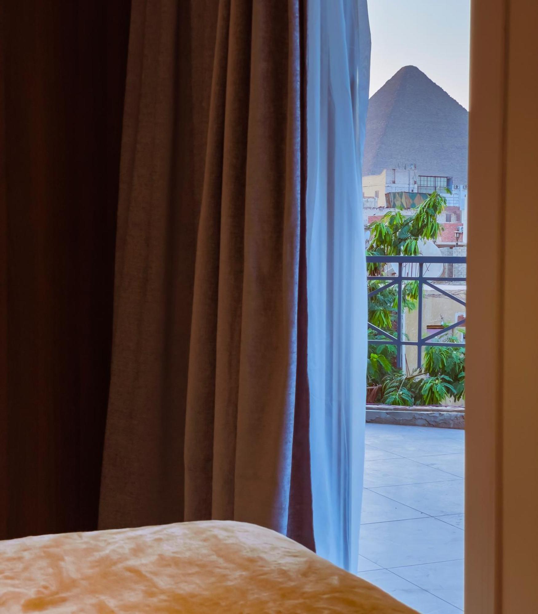 King Khufu Pyramids View Hotel Kafret el-Gabal Chambre photo
