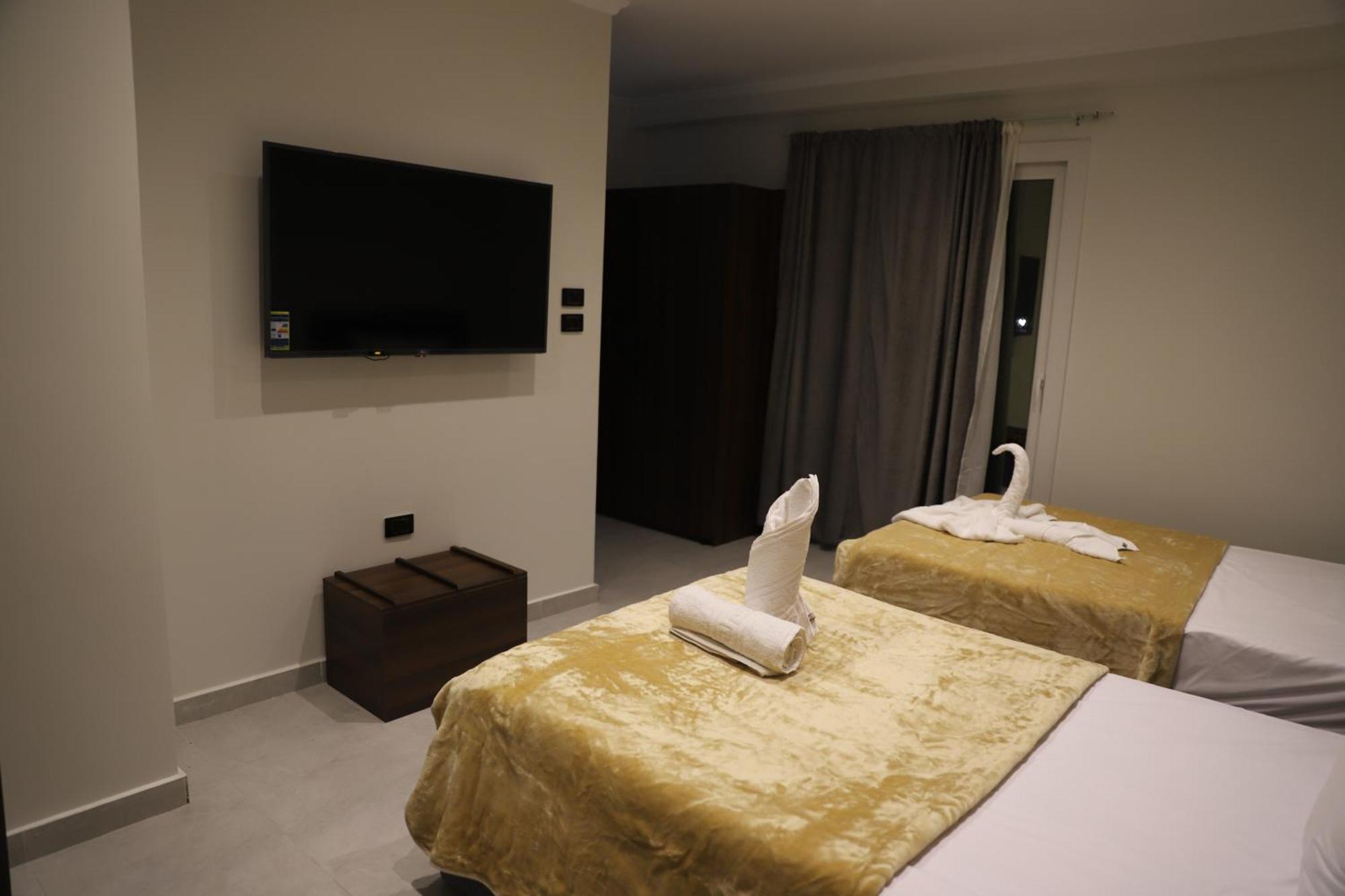 King Khufu Pyramids View Hotel Kafret el-Gabal Chambre photo