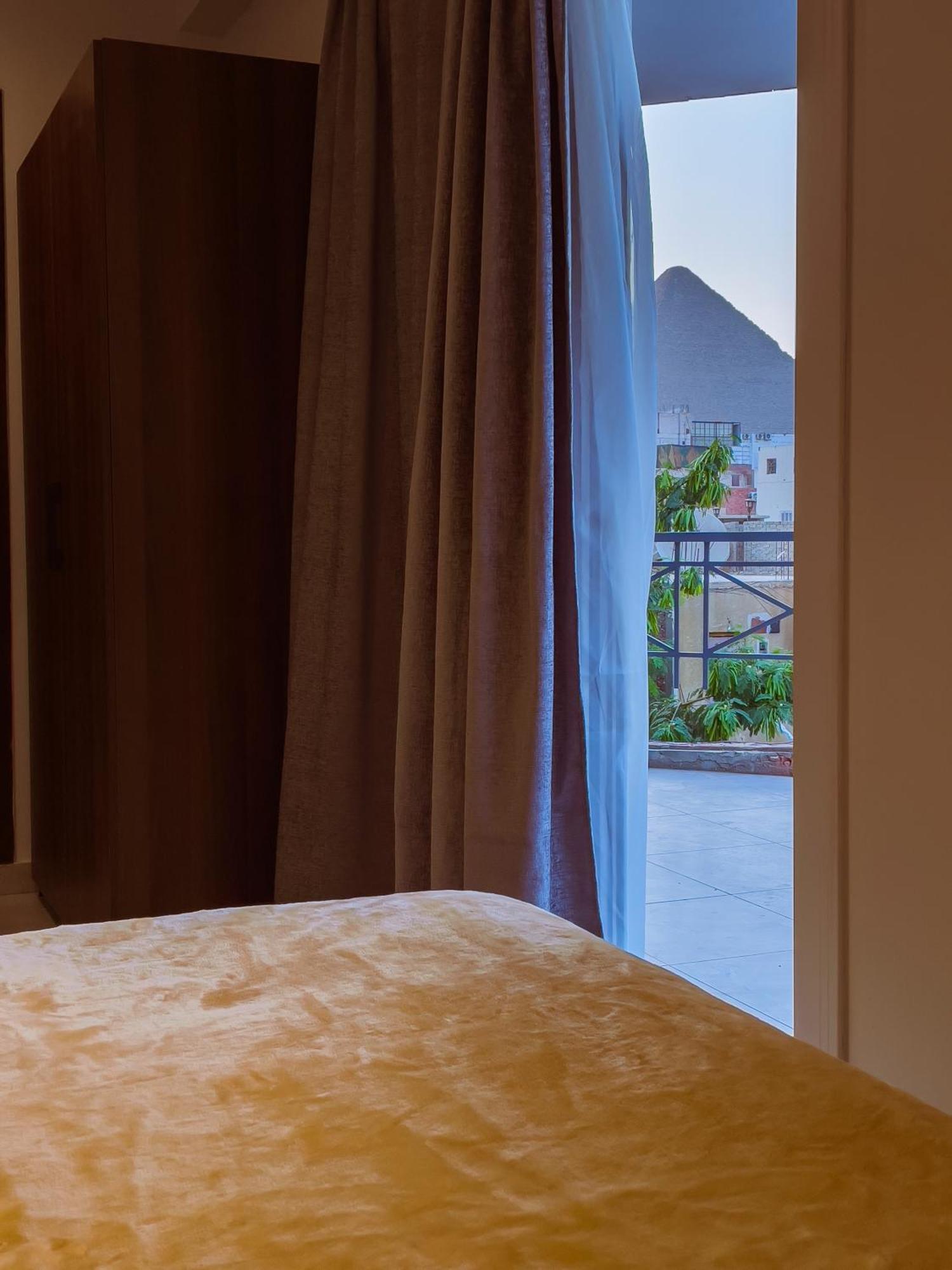 King Khufu Pyramids View Hotel Kafret el-Gabal Chambre photo